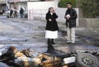 Evidence of the violence: the aftermath of a bomb explosion outside a church