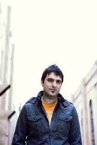 Joel Auge: A songsmith opposed to simplistic "worship" labeling