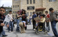 Photo credit: Christian Aid / Antonio Olmos - Children play outside Christian Aid partner the YMCA, Beit Sahour, Bethlehem, after a trauma counselling session