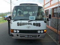 A school bus in St Vincent purchased with Fairtrade premiums from banana sales, so that children in the rural areas who had passed exams to go to secondary school could actually get to school